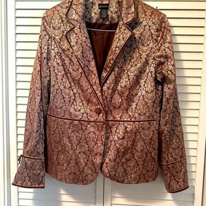 Absolutely gorgeous brown foil print on brown suede like jacket. Size Large